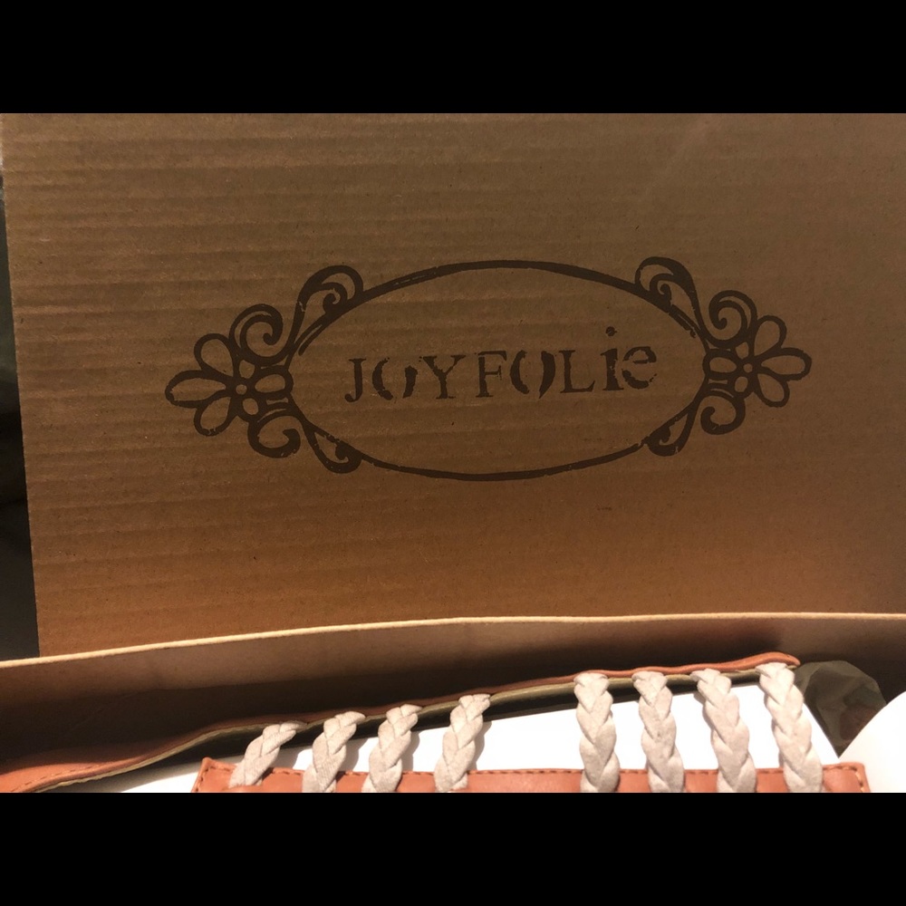 Two size 8 in little girls Joy Folie sandals.